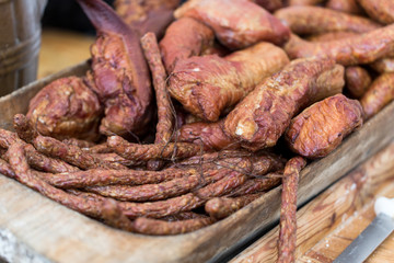 Traditional smoked Polish meat on wooden tray