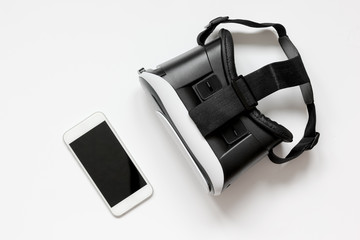 virtual reality glasses with smartphone on white background