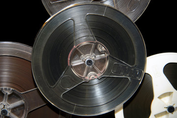 Old rare music reel to tape recorder. Vintage bobine with the music. Nineteenth - twentieth century - most popular medium of recorded music. Historical analog media sound information for gramophones. 