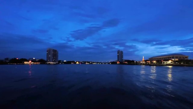Time lapse footage : View from font of the Boat run along the chaophraya river in bangkok

