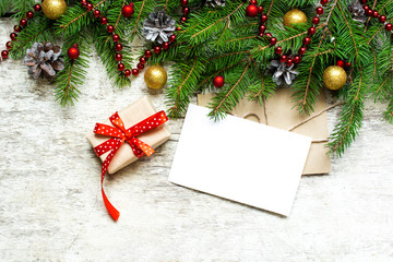 blank white xmas greeting card with fir tree branches