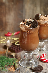 Christmas hot chocolate with whipped cream and cookies.Space for