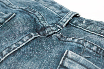 Blue jean or denim on wooden desk,make pattern background,make from cotton,bag of jean