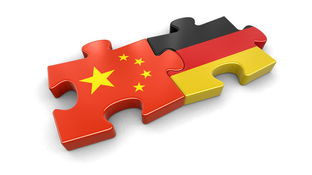 China and German puzzle from flags. Image with clipping path