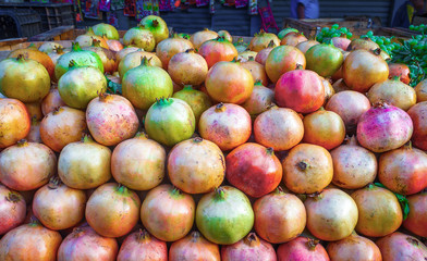 Ripe group pomegranate fruit on market in Morocco