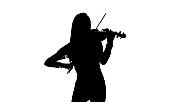 Girl playing the viola. Silhouette on white background. Slow motion