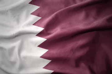 Fotobehang waving colorful flag of qatar. © luzitanija