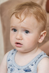 Fototapeta premium Portrait of a cute, charming kid looking forward