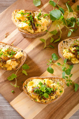 Scrambled eggs on toast with herbs