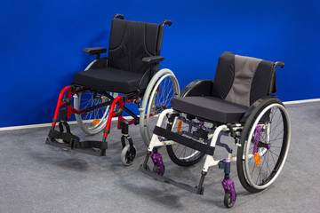 New wheelchairs in the exhibition hall. Medical equipment