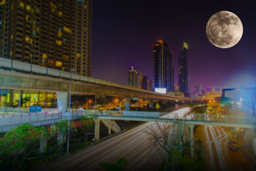 Fototapeta na wymiar Full moon over the city at night, Super moon