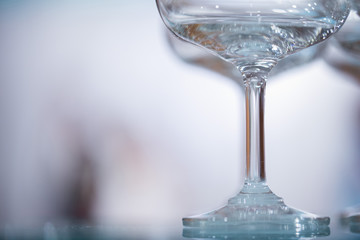 The legs of a wine glass shape background.