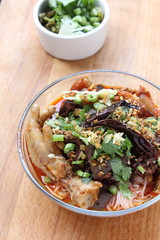 Rice noodles with spicy pork sauce