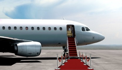 Obraz premium Wejście do odlotu samolotu z czerwonym dywanie