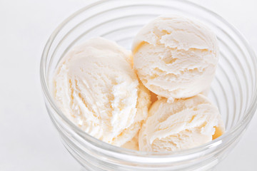Vanilla sundae ice cream in cup on white background