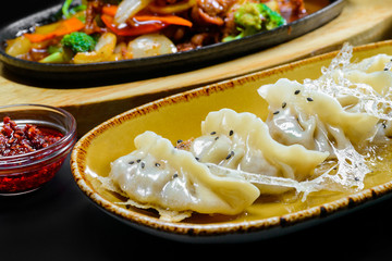 Korean dumplings with sauce