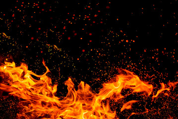 Bonfire flames over black background