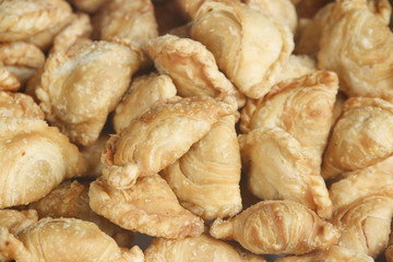 Stock Photo:.spinner curry puffs on detail