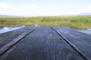Stock Photo:.wooden desk top and sky