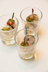  mussels cocktail  with sauce in a glass