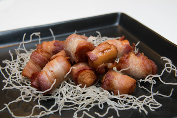  sausages wrapped in bacon  meal snack