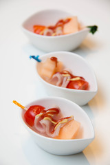  canapes  with  food ingredients served for appetizer