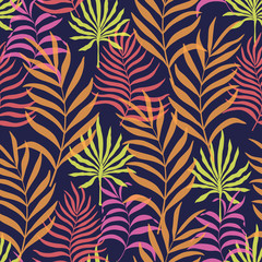 Fototapeta premium Tropical background with palm leaves. Seamless floral pattern