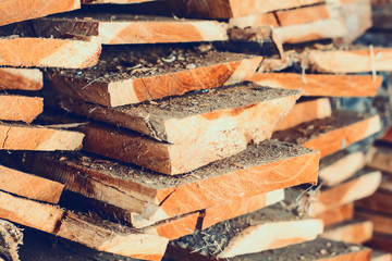 Large stack of wood planks