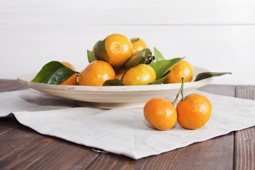 Still life with tangerines (mandarins) on plate