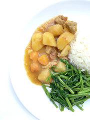 Japanese curry with curry and Stir Fried Water Spinach with rice in white dish isolate on white background, Thai style food.