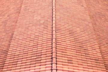 Naklejka premium Perspective of red tiles roof.