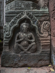 Man or god carving on sand stone at Phimai historical park. Pras