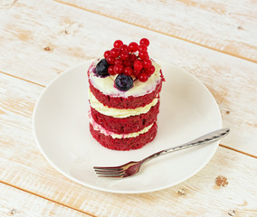 Red cake with berries