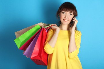 Super sale, shopping, discount, fashion concept:  woman with many shopping bags  