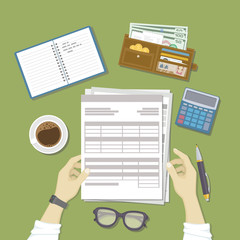 Man working with documents. Men's hands hold the accounts, payroll, tax form. Workplace with papers, notebook, wallet with money, calculator, pen, glasses, coffee. Work business, financial process.