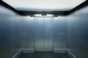 Interior view of a modern elevator - obrazy, fototapety, plakaty