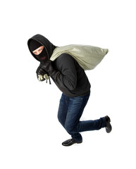Thief running with heavy bag