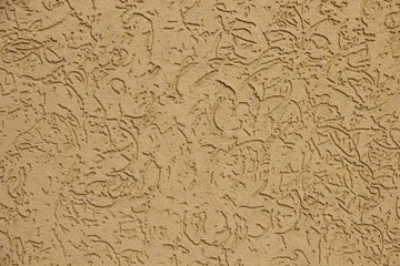 yellow-brown wall texture with abstract pattern