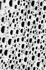 bw photo water drops of on treat water-repellent surface in macro lens shot small-DOF for screen...