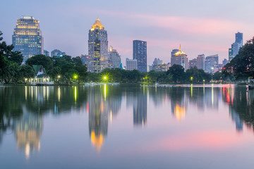 Business district cityscape from Lumphini park, Bangkok Thailand