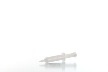 Four blank plastic containers for medicine on white background