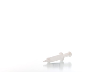 Four blank plastic containers for medicine on white background