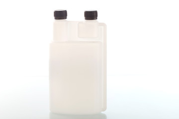 Four blank plastic containers for medicine on white background