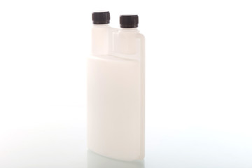 Four blank plastic containers for medicine on white background