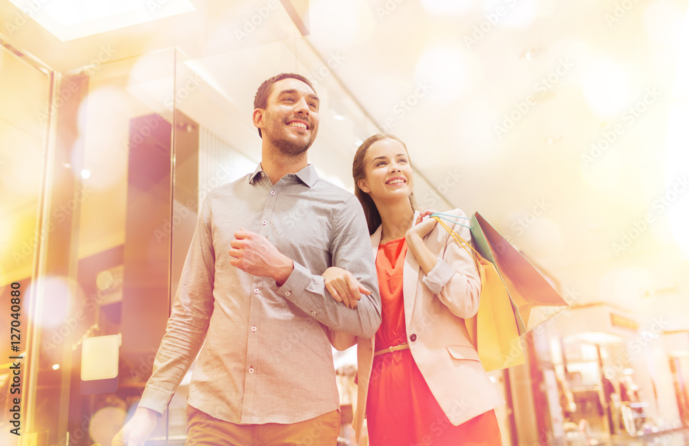 Canvas Prints happy young couple with shopping bags in mall