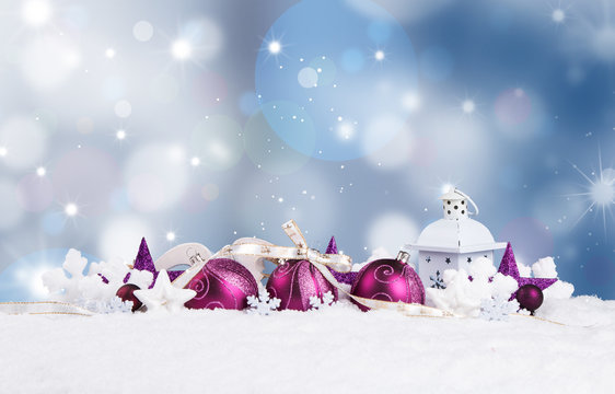 Christmas decoration in snow background with free space. Celebration balls and other decoration. Christmas concept