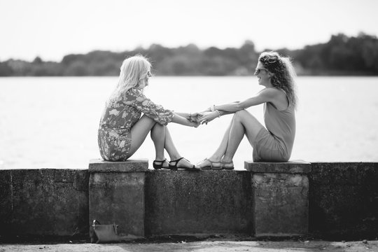 Two Best Girl Friends Having Fun At Lake