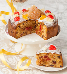 Delicious Christmas cake with candied fruit, nuts and spices.
