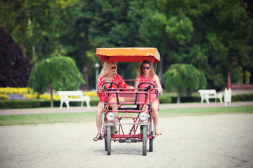 Women enjoying beautiful summer day at lake
