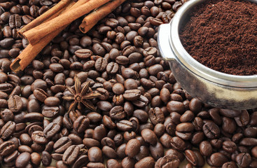 coffee beans on wood background, over light